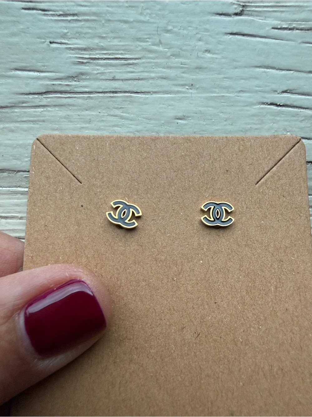Gold and Black Interlocking Stud Earrings